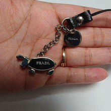 Load image into Gallery viewer, PRADA TELEPHONE STRAP BAG CHARM KEYRING HIPPOPOTAMUS Silver Black CHARM LOGO
